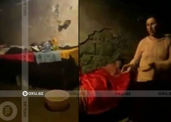 Ana yataq xəstəsi olan üç uşağı ilə birlikdə su basan daxmada yaşayır - Video