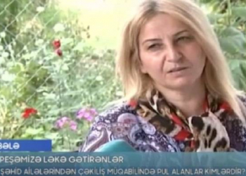 Şəhid ailələrindən çəkiliş üçün pul istəyən qadın danışdı - Video